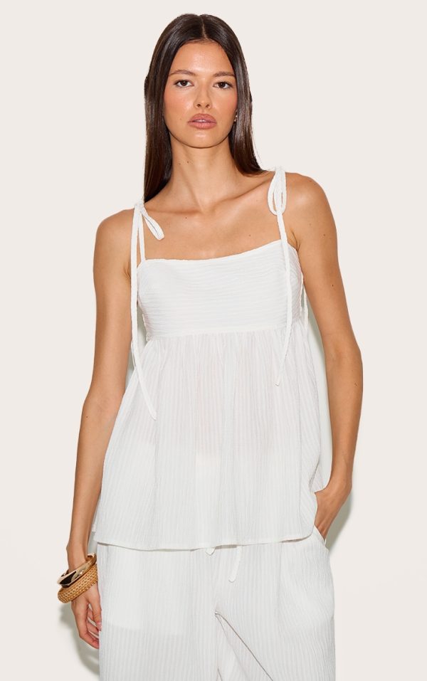 12dfa1ab1cced18a35a922007061c1558f94d2d4_CNM1915_1_white_woven_textured_striped_floaty_top