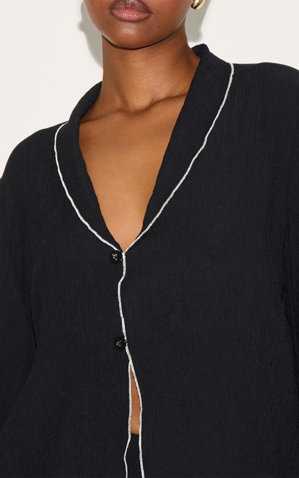132ec060e361db016e649327e9aa73719b99f6fa_CNM5354_4_black_textured_contrast_trim_oversized_shirt