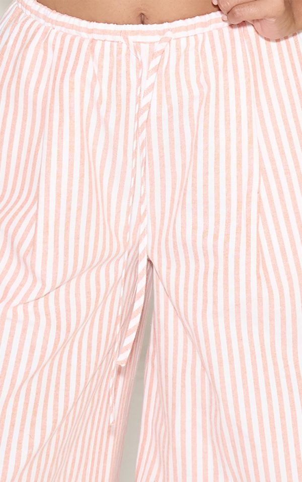 145a2864f537b1d9552b5f7225f66cbd932c5a8b_CNM8814_4_orange_mid_rise_wdie_leg_trousers