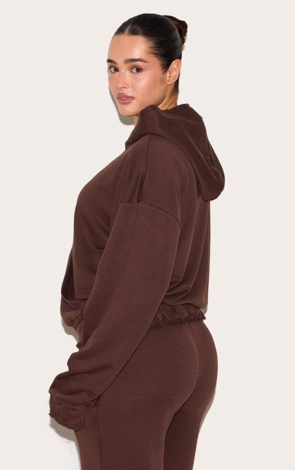 15424a7e751f7e87fdc738cef81338ff1a4de58d_CNM1975_2_shape_chocolate_zip_through_hoodie