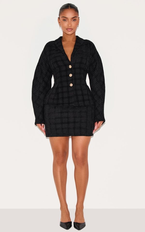 1736a33bc8f1087114b0e7d7315a3265302dd47a_CNM2860_1_shape_black_boucle_mini_skirt-1