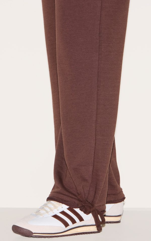 17c3d3b071235d1bba7a629c350df7e3c71adce7_CNM1974_4_shape_chocolate_highwaisted_back_slogan_joggers