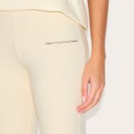 18f18899a3be6d811f7e0a29b4af106070e635db_CNI8523_4_prettylittlething_beige_printed_flared_trousers