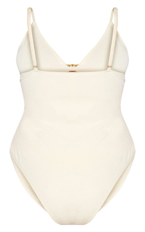 1913fc52a77d53da2b4ae245c7c23801fa9bcf05_CNM4875_6_plus_cream_textured_flower_trim_plunge_swimsuit