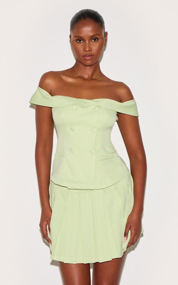 195978554f3c179a98353e45932ef9505cca8236_CNL9256_1_pale_lime_tailored_button_detail_bardot_pleated_skort_playsuit