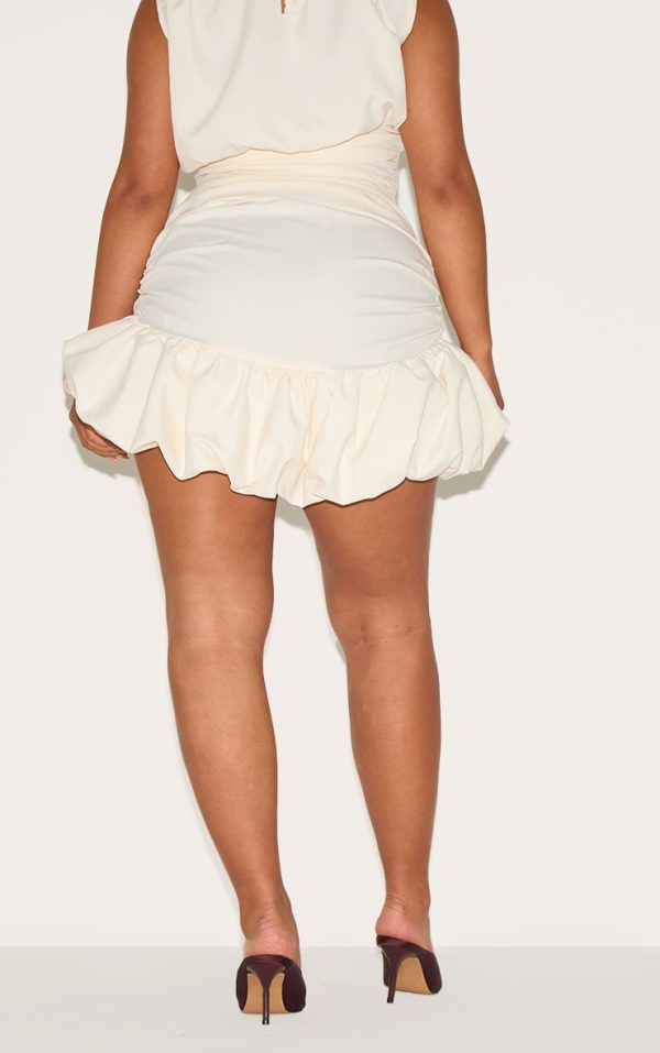 1984b83cbfc6024c28a0423af0f4835fa30a61a7_CNM6475_3_shape_cream_ruched_dropped_hem_puffball_mini_skirt