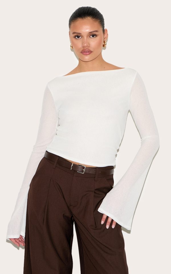 199d0b7f6c7618a9eaf6b2a6c23602a9cf1ed4d1_CNM8045_1_white_double_layer_burn_out_mesh_asymmetric_flared_sleeve_top