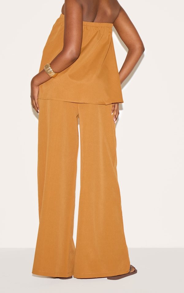 1a7a7b61177b3d20e00e684f8ae2c426c5e544e9_CNM8913_3_deep_mustard_woven_mid_rise_wide_leg_trousers