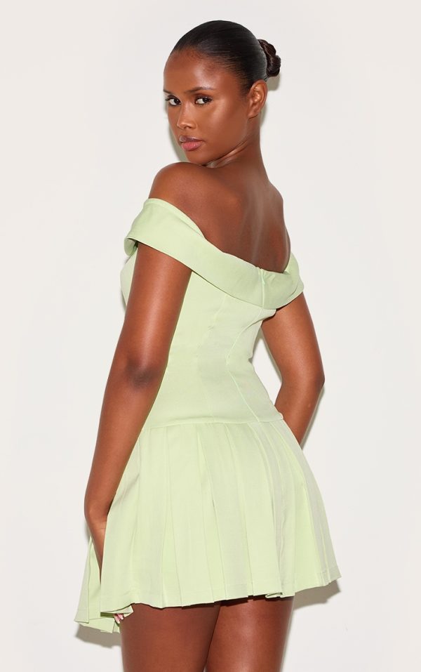 1a85f4f74129cd8cd7a462be14280e17a1ef439a_CNL9256_2_pale_lime_tailored_button_detail_bardot_pleated_skort_playsuit