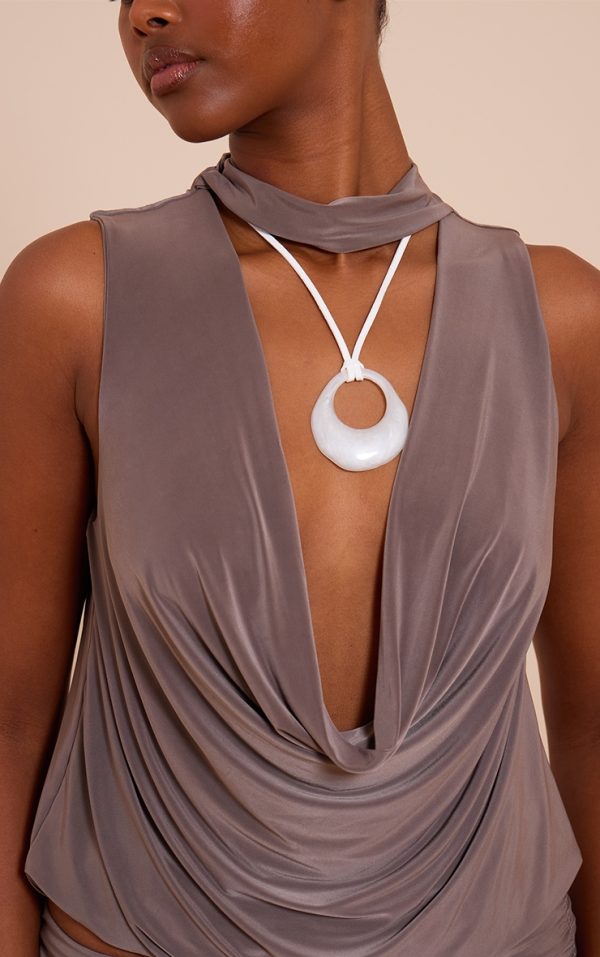 1b4bb254de93a12c2487e5d143ab10ad0241914b_CNM9594_1_gold_abstract_pendant_cream_cord_necklace