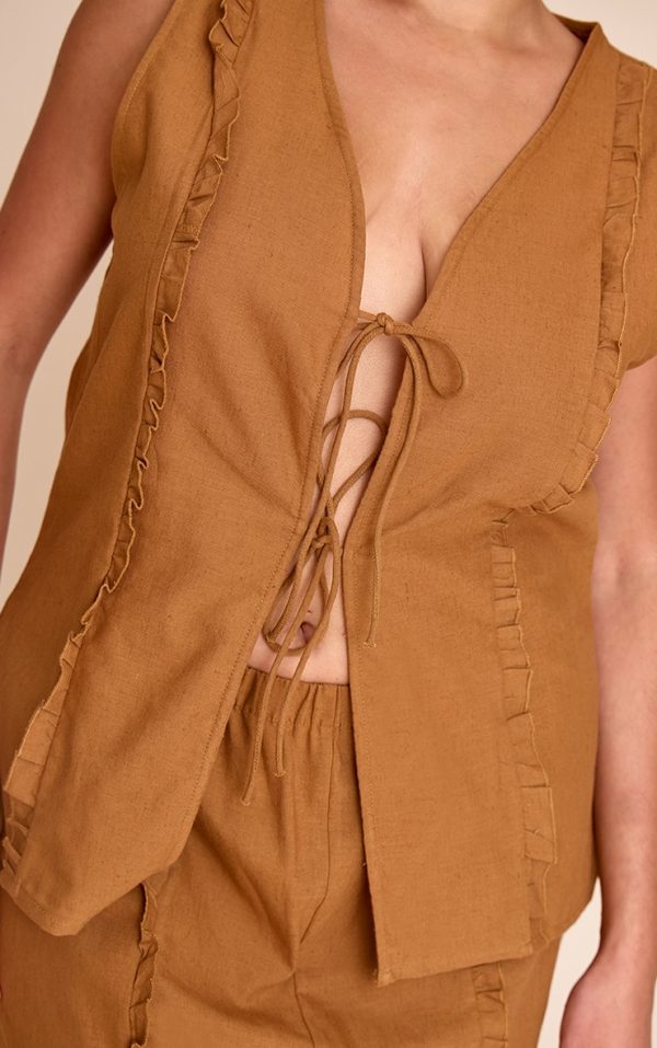 1b5493f44710ec3cf1028d7697b2f997ab184e89_CNM5050_4_plus_tan_sleeveless_tie_front_top