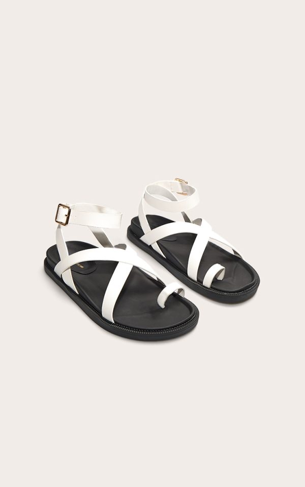 1bc824703e02911bdd0bf1b29a63d662784808c4_CNL6588_2_white_pu_round_toe_ankle_strap_footbed_sandals
