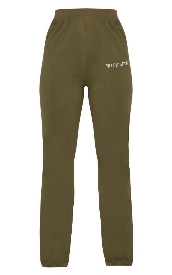 1bd9c1e68a47e36ad2e25ba982e717bef4e63476_CNH5589_5_prettylittlething_plus_khaki_jersey_skinny_flared_trousers