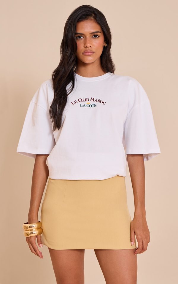 1cdfc4c0437488f394c4a1c58fd38197d7e985b6_CNM0101_1_butterscotch_woven_a_line_mini_skirt