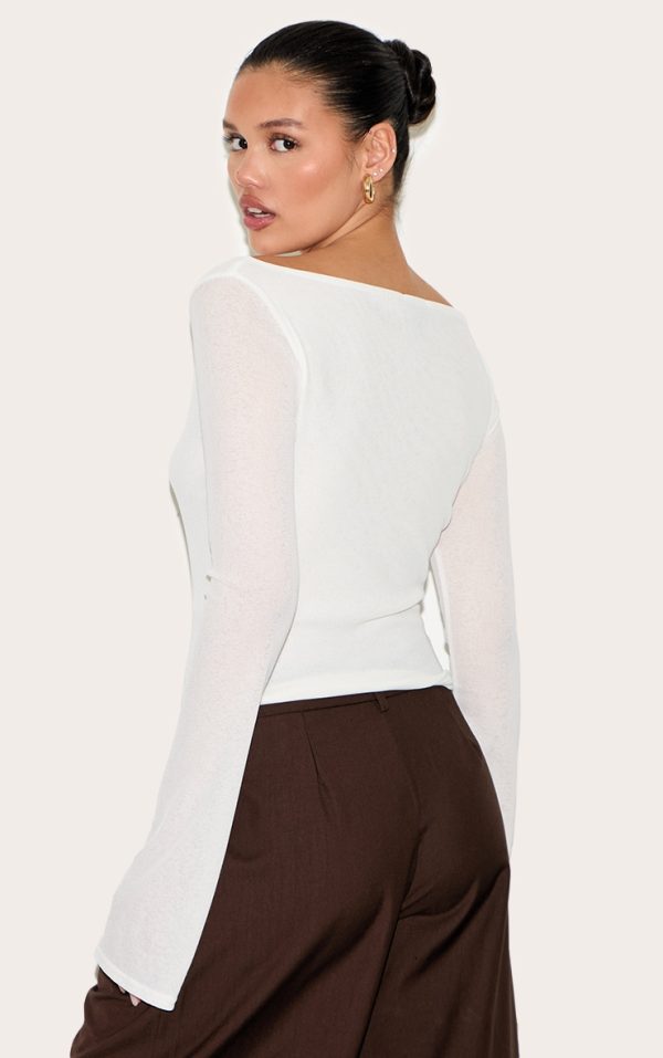 1d0ba31df6fb5802492f9bd017731eec92e51417_CNM8045_2_white_double_layer_burn_out_mesh_asymmetric_flared_sleeve_top