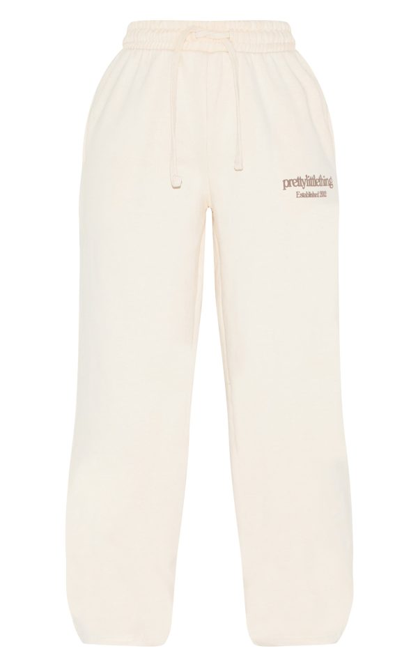 1d8871ab47b8a6e745fc0ab6cee95ffb6d821ce4_CNK1316_5_prettylittlething_petite_cream_premium_print_wide_leg_joggers