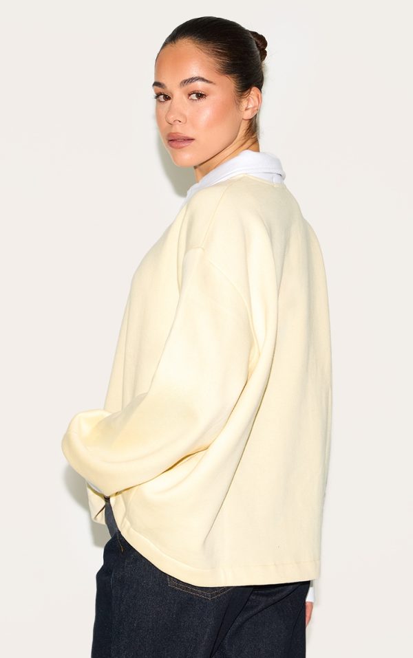 1de1f312457234fac3af441dc0518daab2e88865_CNM6498_2_butter_yellow_oversized_polo_sweatshirt