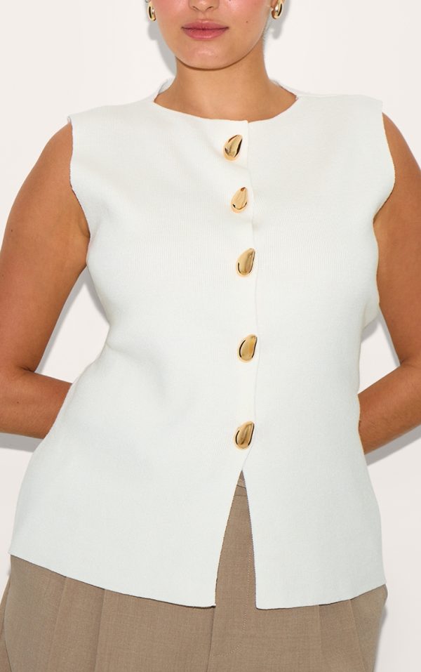 1e73ba1d071cea4a13951743c96c220e286ebf40_CNM7735_4_plus_cream_compact_knit_button_up_waistcoat