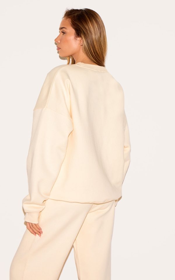 1f64173ab8373117a96b496150c58dd898564902_CNM8141_2_cream_oversized_sweat_tracksuit_set