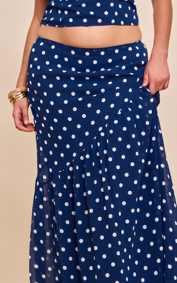 1fff7d131802e665c33be939721175d258aef53e_CNM9701_4_plus_navy_polka_dot_asymmetric_maxi_skirt