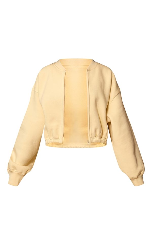 21011dae07b40d78910ad084ff57156c89953ede_CNM9984_5_butter_cream_drawcord_waist_cropped_zip_up_sweatshirt