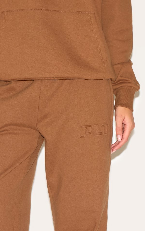 21d786d3327f067f86f848b206363d784b342cbc_CNM4820_4_taupe_prettylittlething_premium_embossed_wide_leg_joggers-1