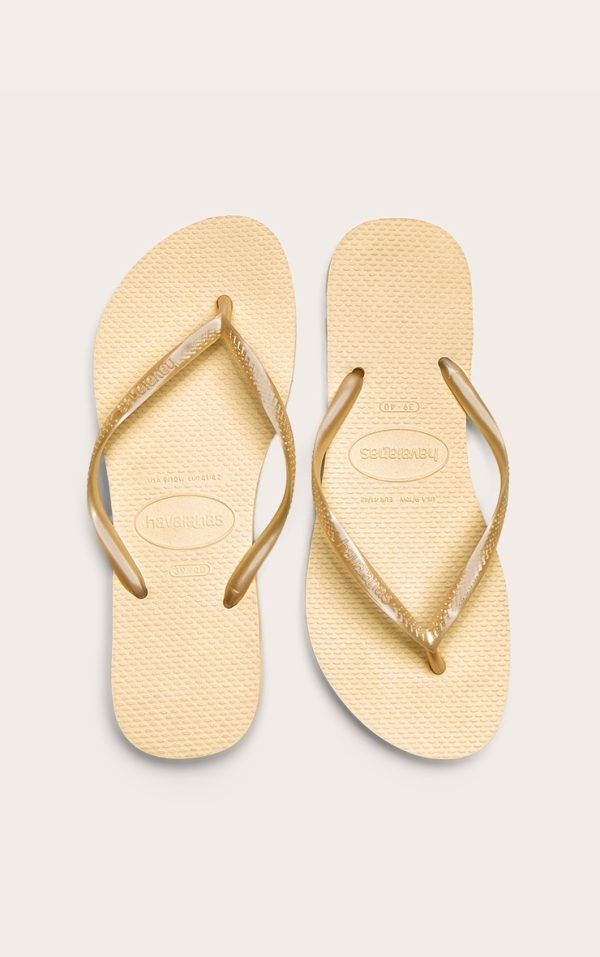 226fabb1c1dd6ad08188e313a712b4e76d4ebc66_CNM1897_1_butter_yellow_havaianas_slim_flip_flops