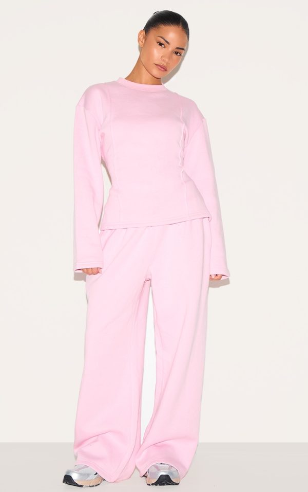 22af5ce88fdb25ee4303eb3e66fd51709c4e017e_CNM7251_3_petite_baby_pink_long_sleeve_waist_cinched_sweatshirt