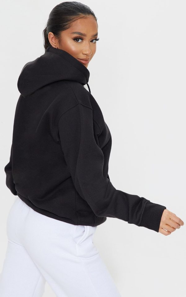 2387453f19de503d2ca2662e4b228e7d6bc213f3_CNG0630_2_prettylittlething_petite_black_oversized_embroidered_hoodie