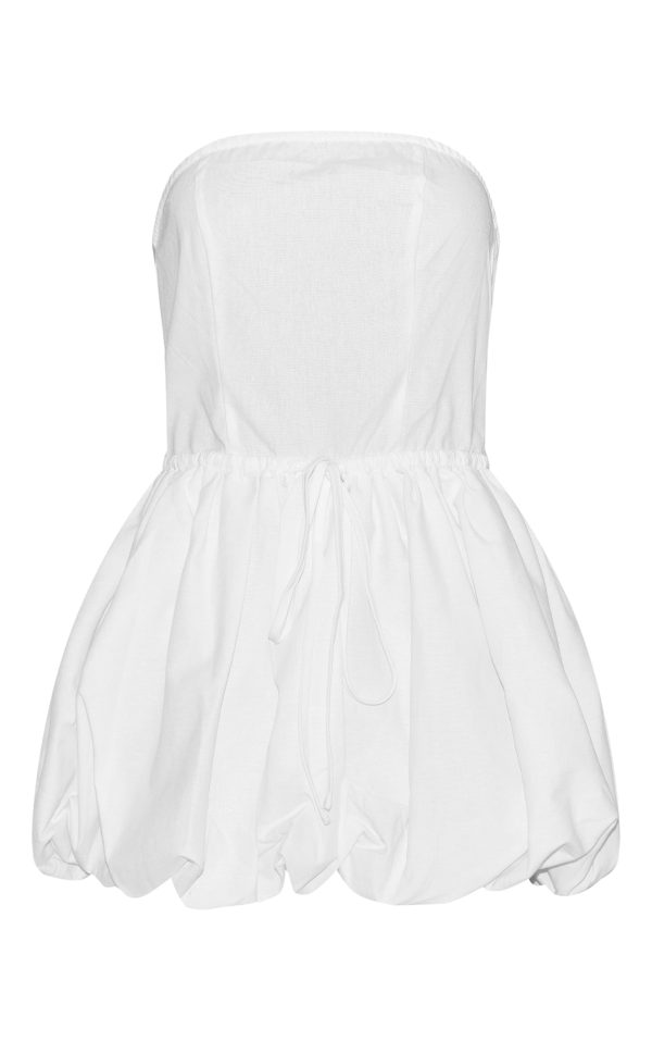 23f4a36769f4d04dac9b97a64f516299831eec18_CNL8932_5_white_linen_bandeau_tie_waist_puffball_dress-1