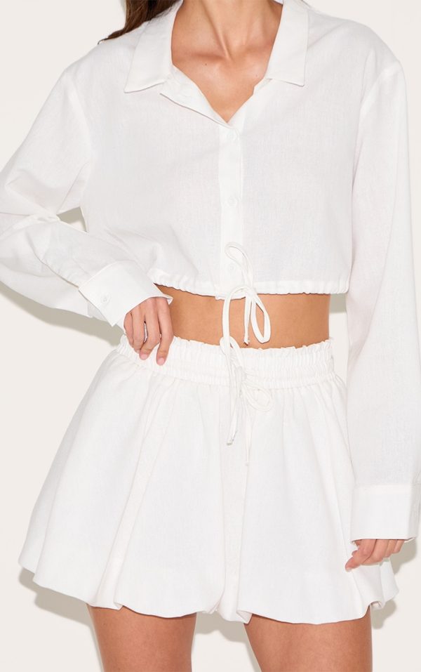 2481fda54fb995f7c590db3013b6d0843353dedf_CNM2101_5_white_drawstring_puff_ball_skirt