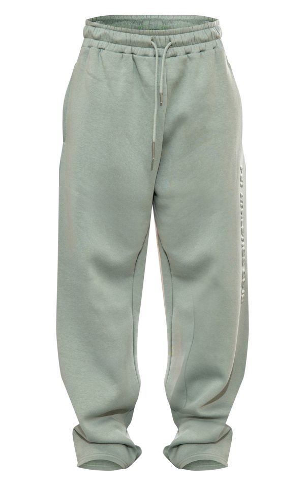 25164acd1d3b6e050b6a3a2a6452be696552d54c_CNK1767_5_prettylittlething_sage_athletics_club_embossed_straight_leg_joggers