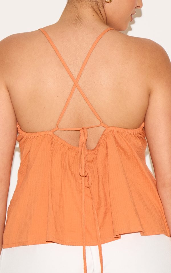 2638844a8f1c11438c4aad1a217f207f4aa647f6_CNM7177_4_plus_orange_textured_boatneck_tie_back_top