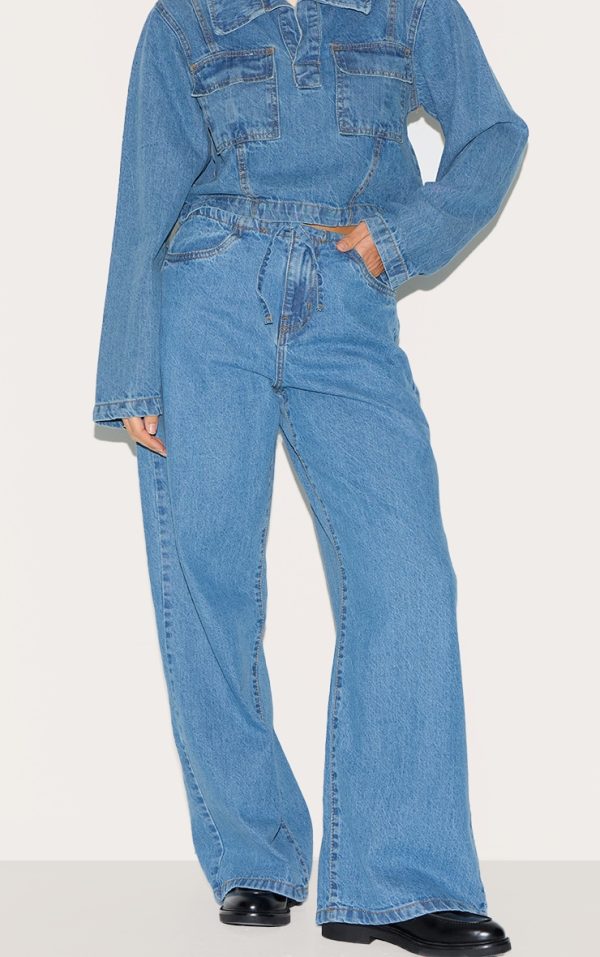 26f413f8c5f2570e1aaf2b60d6e5f09915341ced_CNL6630_2_mid_blue_wash_low_rise_tie_waistband_wide_leg_jeans-1