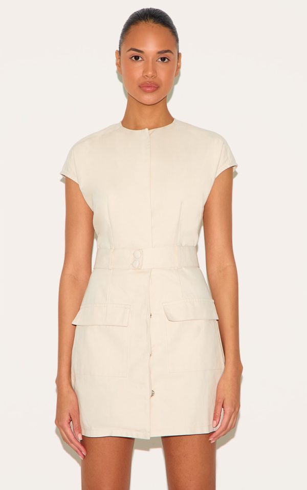 27238232f2854f1d86604f4fb29a38282b07c914_CNM0574_3_almond_woven_utility_pocket_detail_mini_dress-1