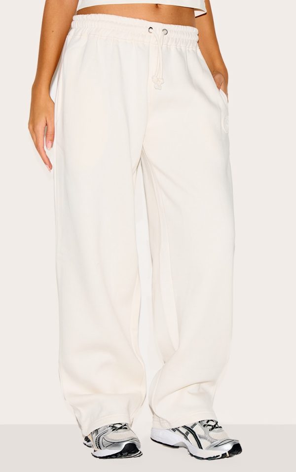 274ae387e47ce1206b75472598af6eef4e1add9b_CNJ8741_2_cream_embossed_drawstring_joggers