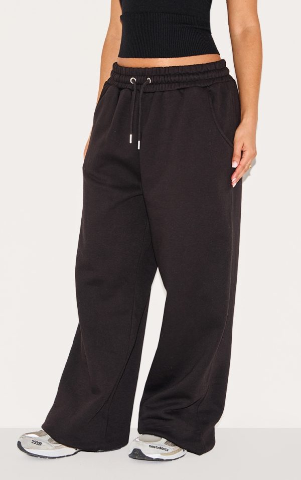 2787bd63321f3f6eea2176b77d0a33caed4bddf8_CNL1402_2_petite_black_wide_leg_drawstring_joggers