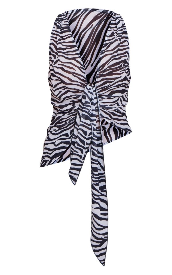 28fa7fab9a6ff88ad260a4139444550ba973f850_CNN1297_5_monochrome_zebra_printed_drape_plunge_front_chiffon_long_top