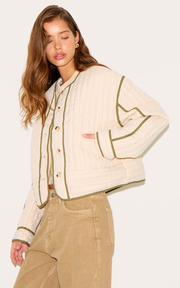 296d50006c0a0c57d31ec2ba1313436e1e1bed7c_CNM1423_1_cream_button_up_round_neck_quilted_jacket