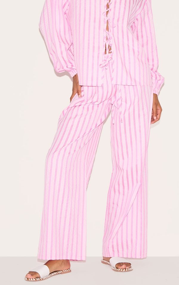 29d0891fd416d0e5bb1d52b9fd212f4844c0b425_CNM1733_2_pink_striped_textured_tie_drawstring_wide_leg_trousers