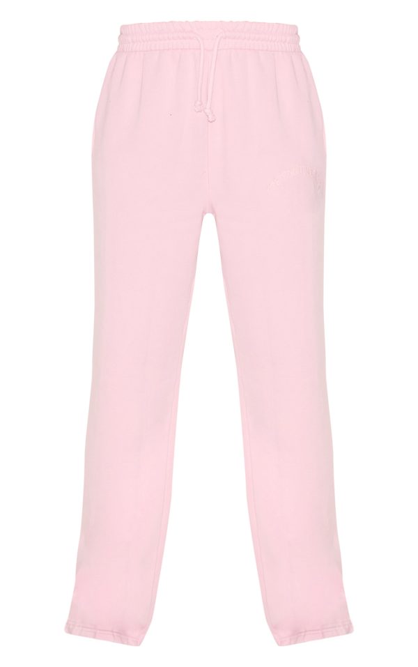 29f2ebc6dbf6336e183619d60d48925ff53978ca_CNJ8961_5_prettylittlething_tall_washed_pink_extreme_oversized_drawstring_wide_leg_joggers