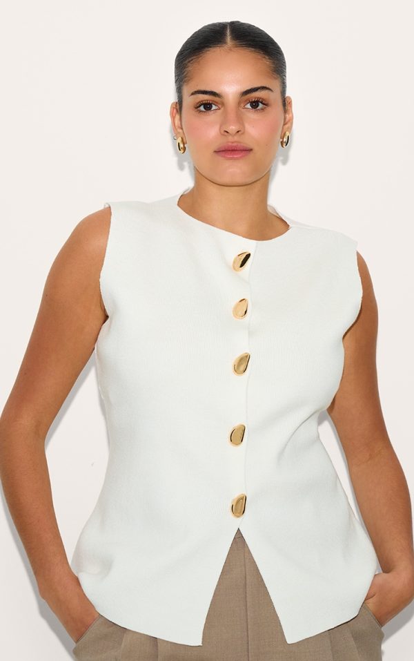 2a2089cec3cd9aa70cba0596b8c168ce0d193e99_CNM7735_1_plus_cream_compact_knit_button_up_waistcoat