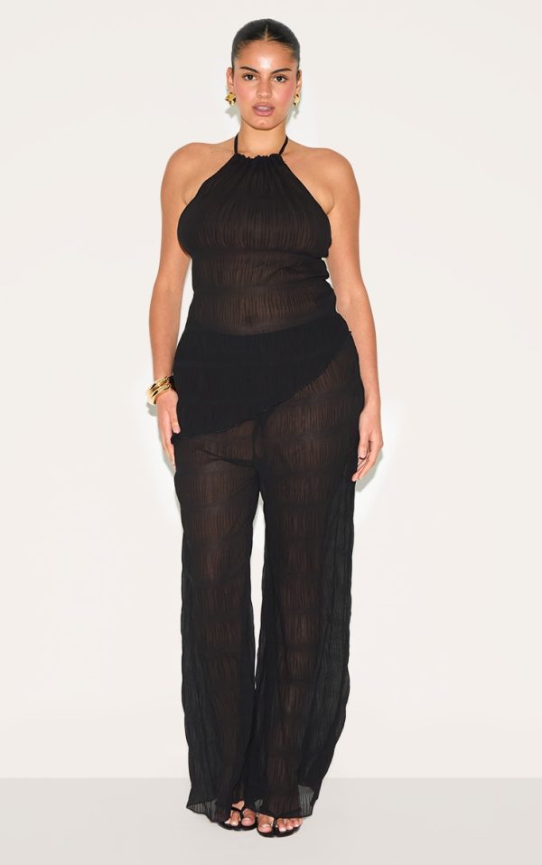 2a3cc08474ca3a89ff3c774d82493af67b941029_CNM5045_3_plus_black_textured_woven_backless_sheer_asymmetric_long_top
