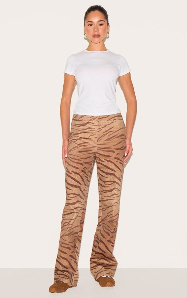 2a58ce52b0ae9e59a0d4027be316f4c52012a5b8_CNM2422_1_brown_tiger_printed_trousers