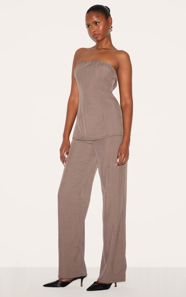 2b43f6ae333a3de0af979933e568c66709f51604_CNL9275_3_taupe_woven_tailored_longline_bandeau_flared_jumpsuit