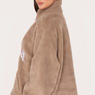 2ba6a6b3214a700d4fef57eeecc182c0d03f78e6_CNL1863_2_taupe_quarter_zip_pocket_detail_fleece