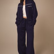 2bcdc11a62dcc9ba6c0260fcc750d3add2bbc88f_CNM4825_3_prettylittlething_dark_blue_contrast_piping_detail_zip_through_track_top