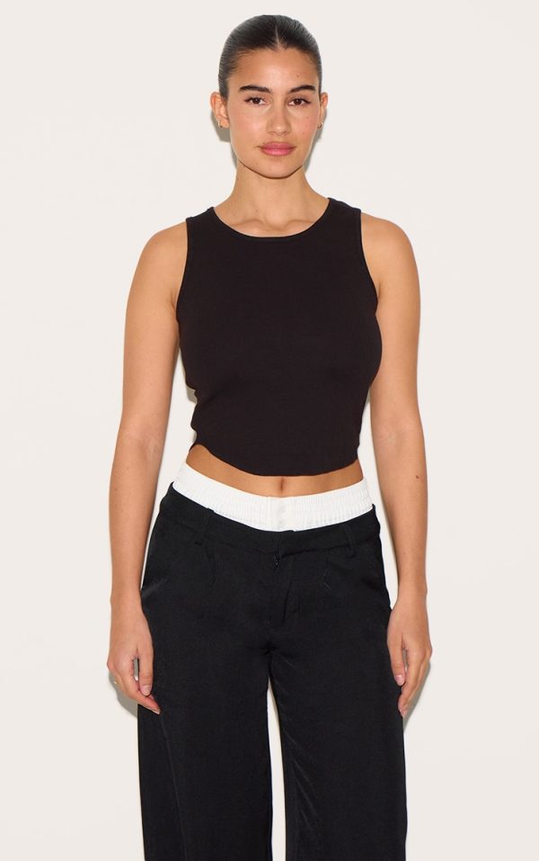 2bff0921d583e9e9f58ea329d134a680790351d8_CNM6004_1_black_ribbed_curve_hem_detail_vest_top