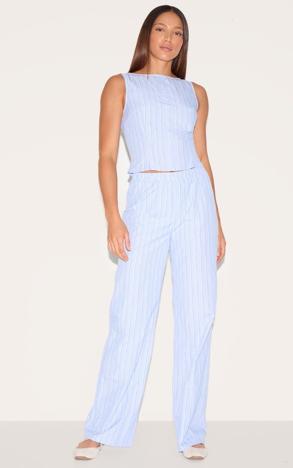 2c847d22fa44ae7c21b955bd61a648136a7d61a0_CNL9718_1_tall_blue_striped_button_detail_flared_trousers