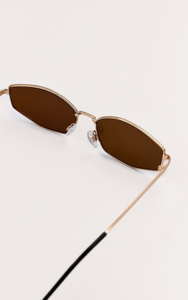 2cc88c7541f797874c12fc82961eedd8f9d4fcdc_CNM9163_4_gold_silver_slim_brown_round_sunglasses